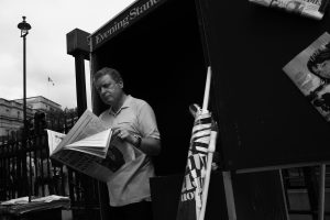 Man reading newspaper